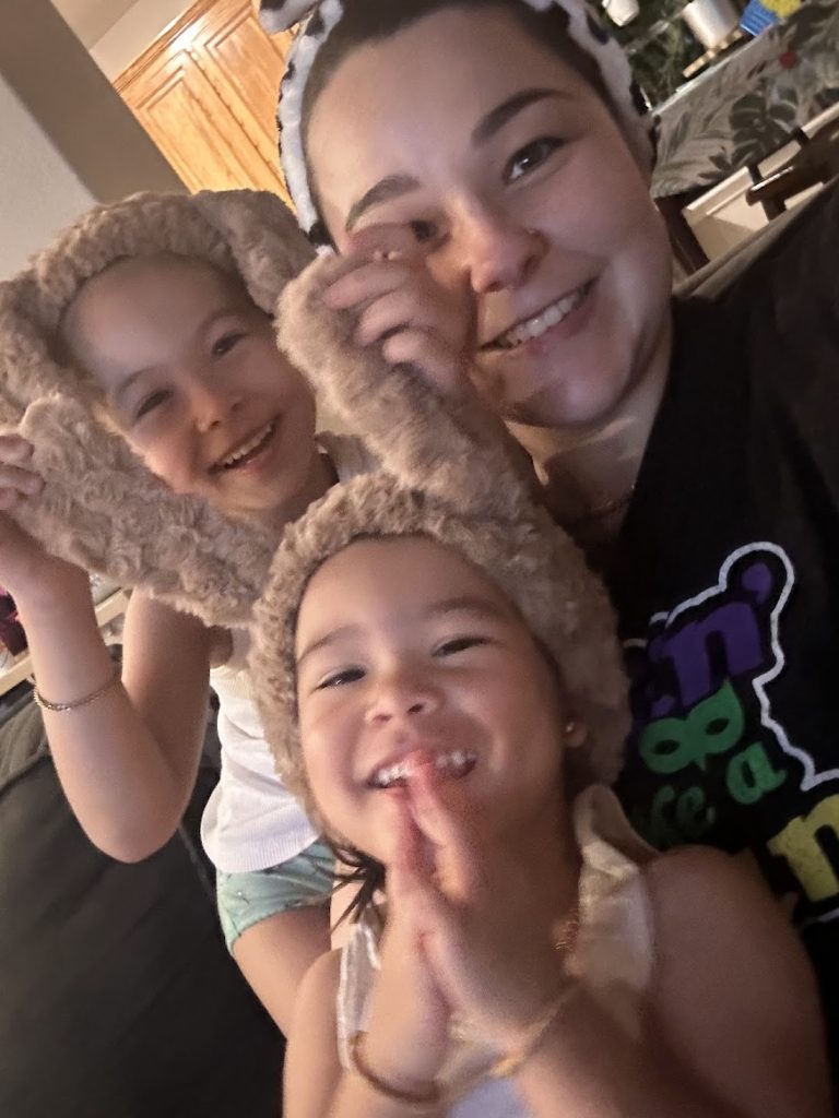 Nicole Phommanorat, neurodivergent / ADHD homeschooling mom, with daughters relaxing at home doing skincare.